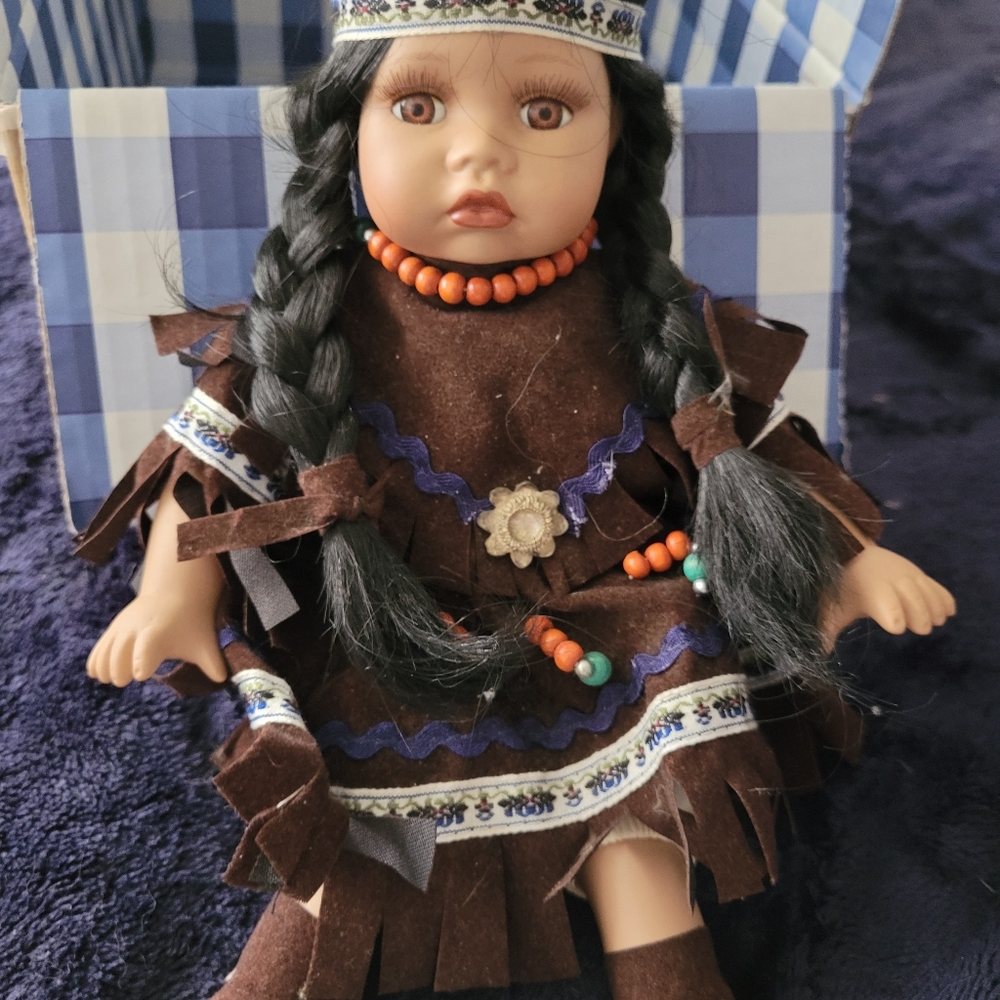 *****SOLD***** Goldenvale 1-2000 sitting native American porcelain doll "Aileen"